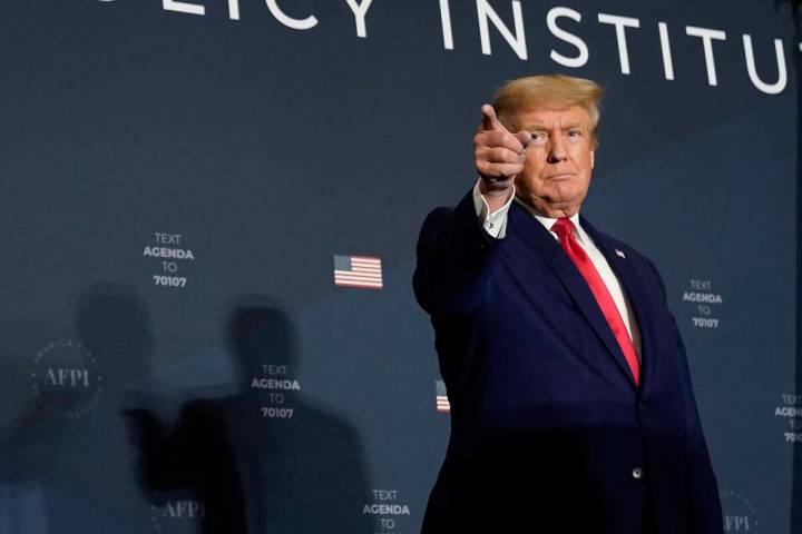 FILE - Former President Donald Trump speaks at an America First Policy Institute agenda summit ...