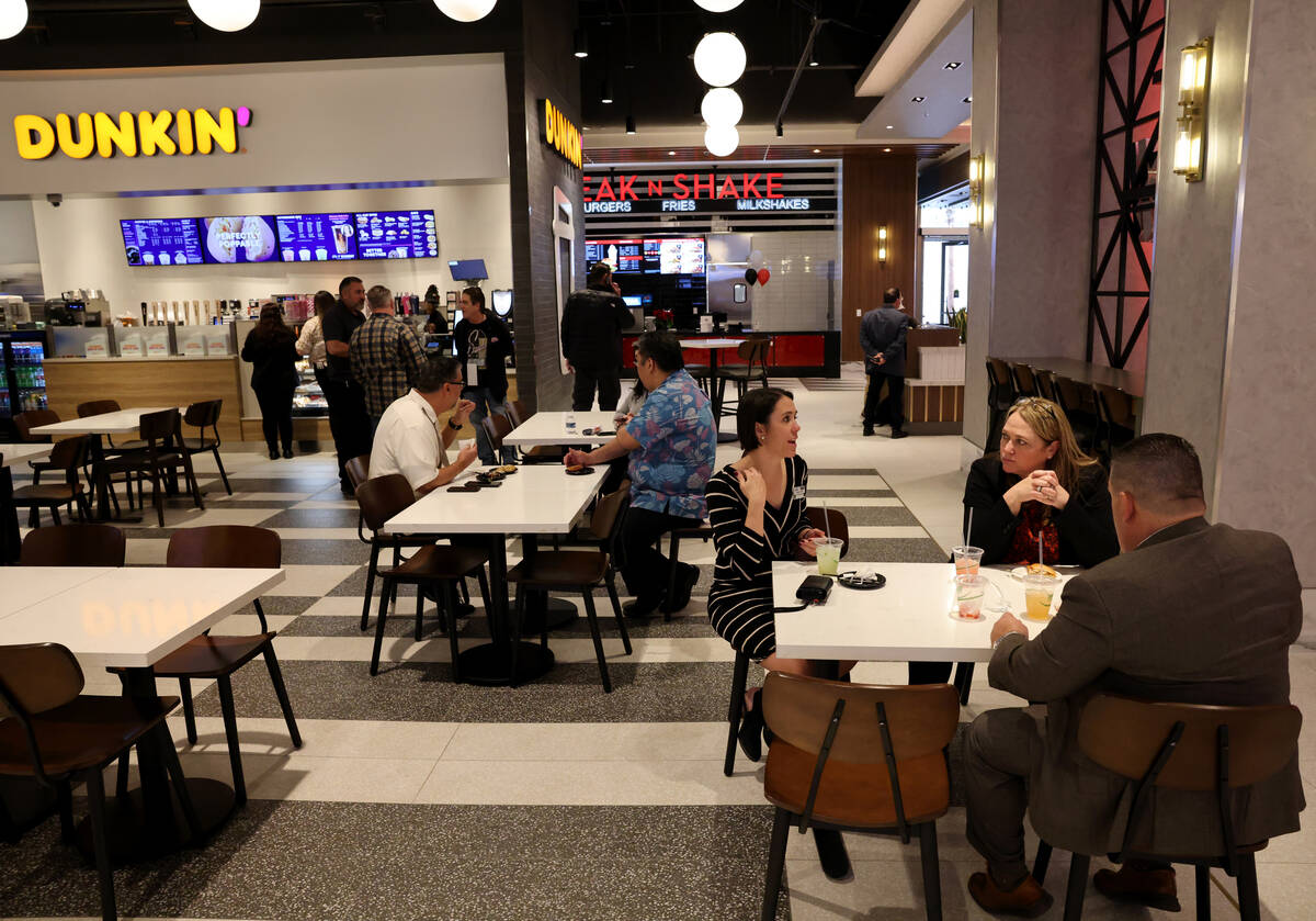 Guests mingle during the grand opening of Fremont Hotel Casino’s new Food Hall in downto ...