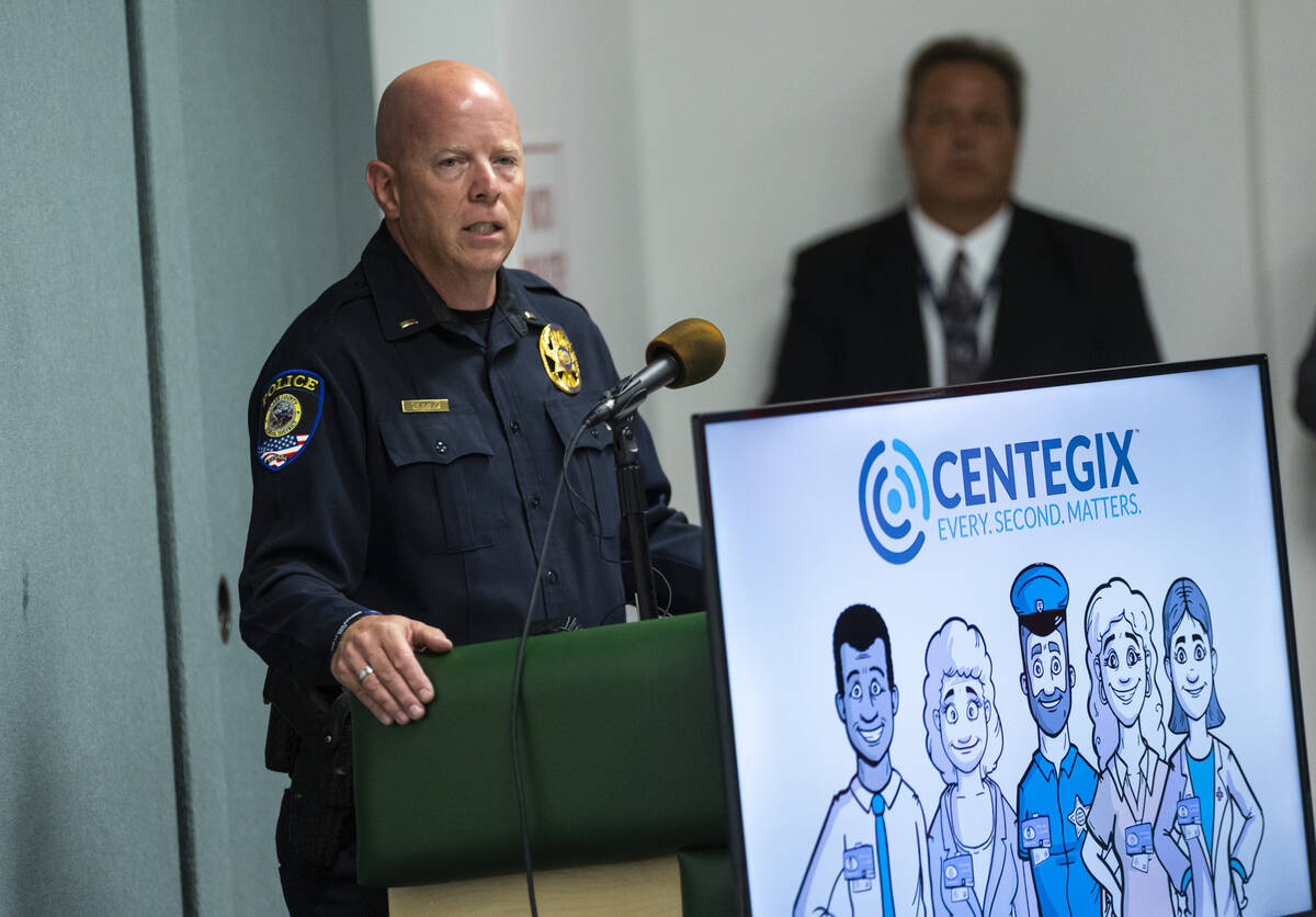 Lt. Bryan Zink of the Clark County School District Police Department speaks during an event mar ...