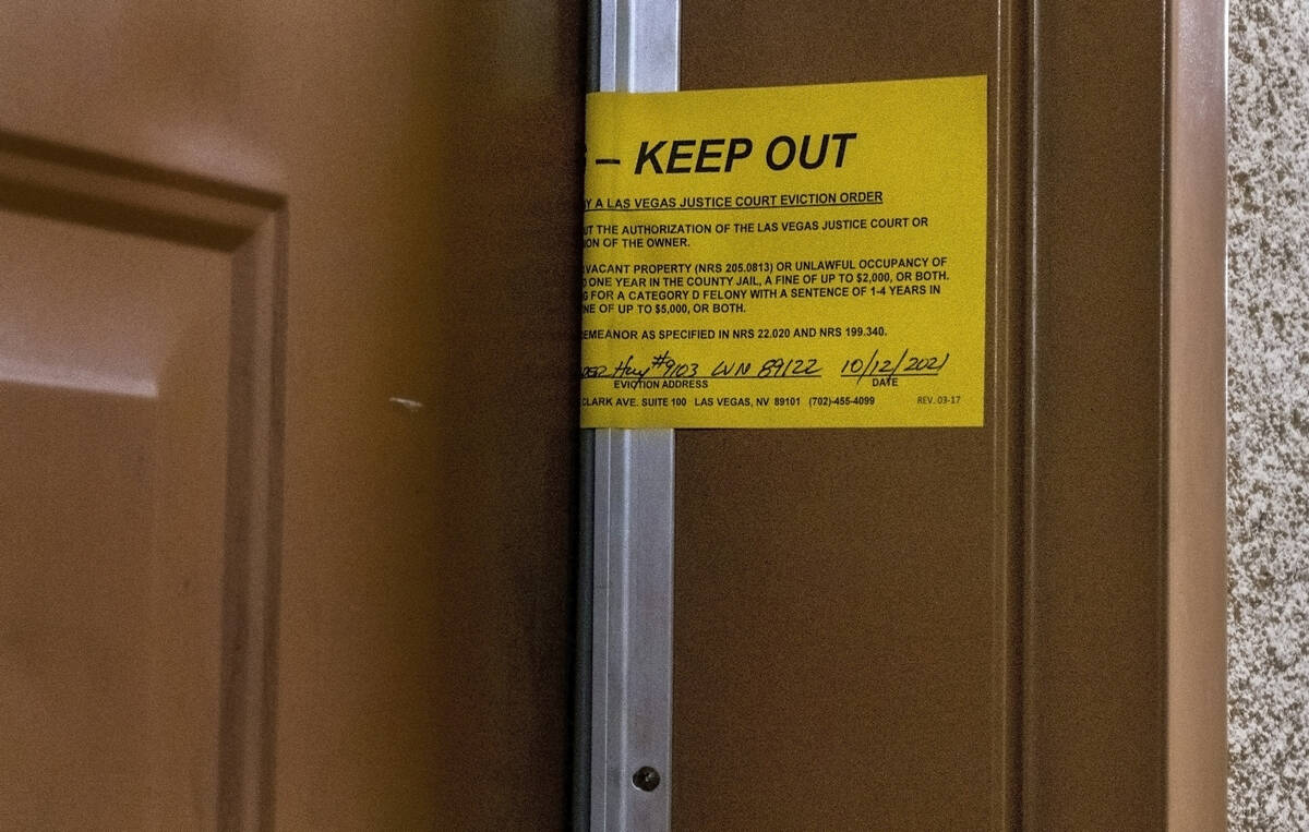 A Las Vegas Justice Court eviction notice is posted on a door in Las Vegas on Thursday, Oct. 21 ...