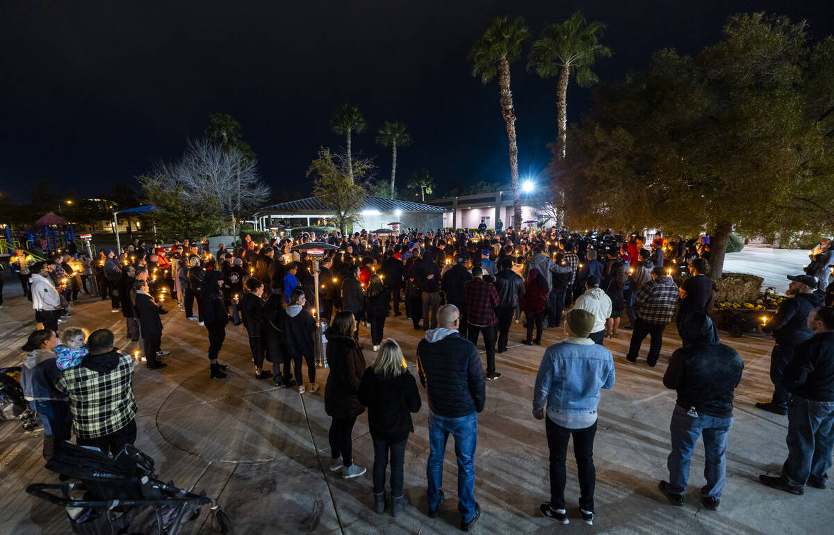 Family and friends of Jonet Dominguez honor him during a candlelight vigil at Awaken Las Vegas ...