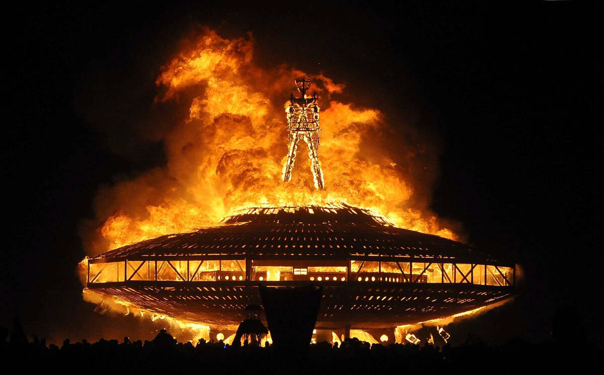 The "Man" burns on the Black Rock Desert at Burning Man near Gerlach on Aug. 31, 2013. (Andy Ba ...