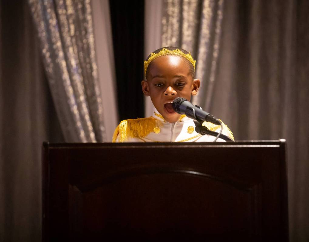 Justyn Boumah, 7, speaks at the 41st annual Martin Luther King Jr. committee banquet at the Ore ...