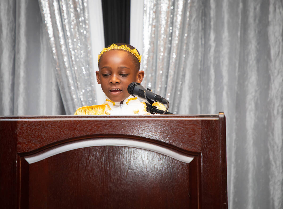 Justyn Boumah, 7, speaks at the 41st annual Martin Luther King Jr. committee banquet at the Ore ...