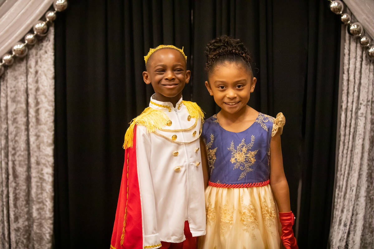 Justyn Boumah, left, 7, poses for a photo with fellow junior grand marshall, Ava Ramirez, right ...