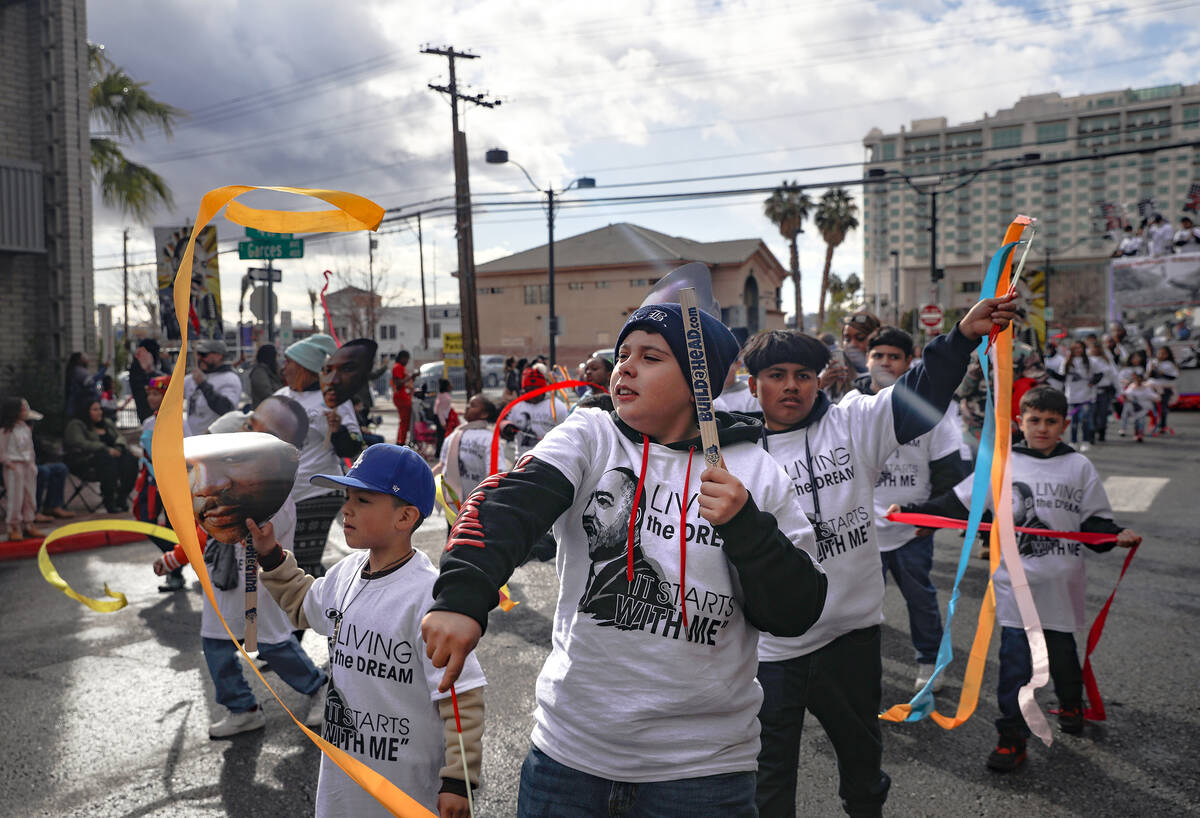 Kids from Martin Luther King Jr. Elementary School walk in the 41st annual Martin Luther King J ...