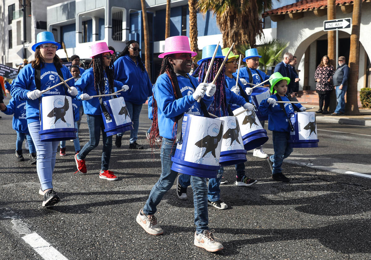 Kids from Wendell P. Williams Elementary School walk in the 41st annual Martin Luther King Jr. ...