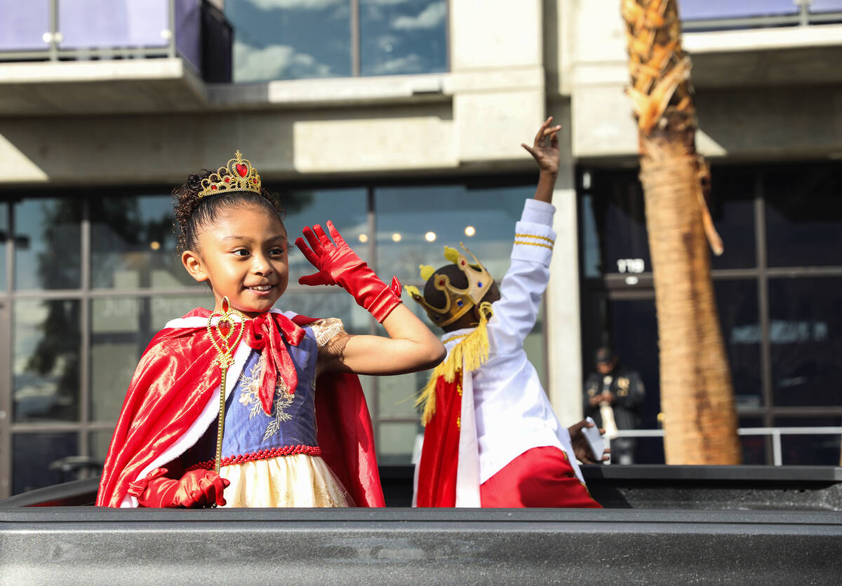 Junior grand marshal Ava Ramirez, 8, waves at the crowds in the 41st annual Martin Luther King ...