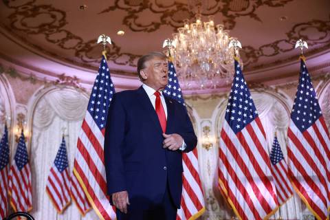 Former U.S. President Donald Trump arrives on stage to speak during an event at his Mar-a-Lago ...