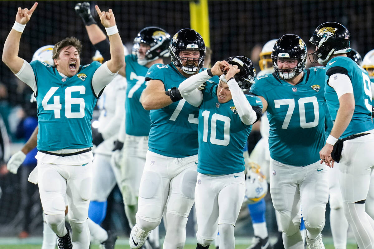 Jacksonville Jaguars place kicker Riley Patterson (10) and his team celebrate his game-winning ...