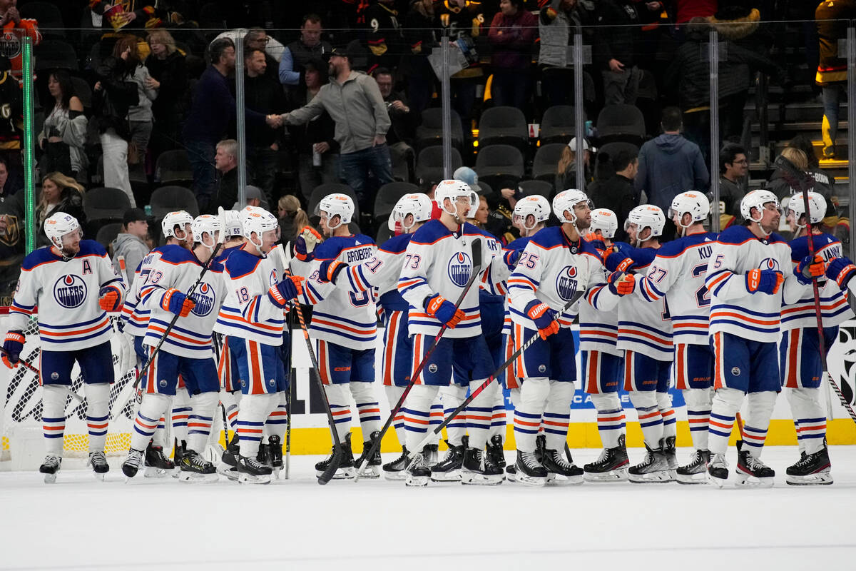 Edmonton Oilers celebrate after defeating the Vegas Golden Knights in an NHL hockey game Saturd ...