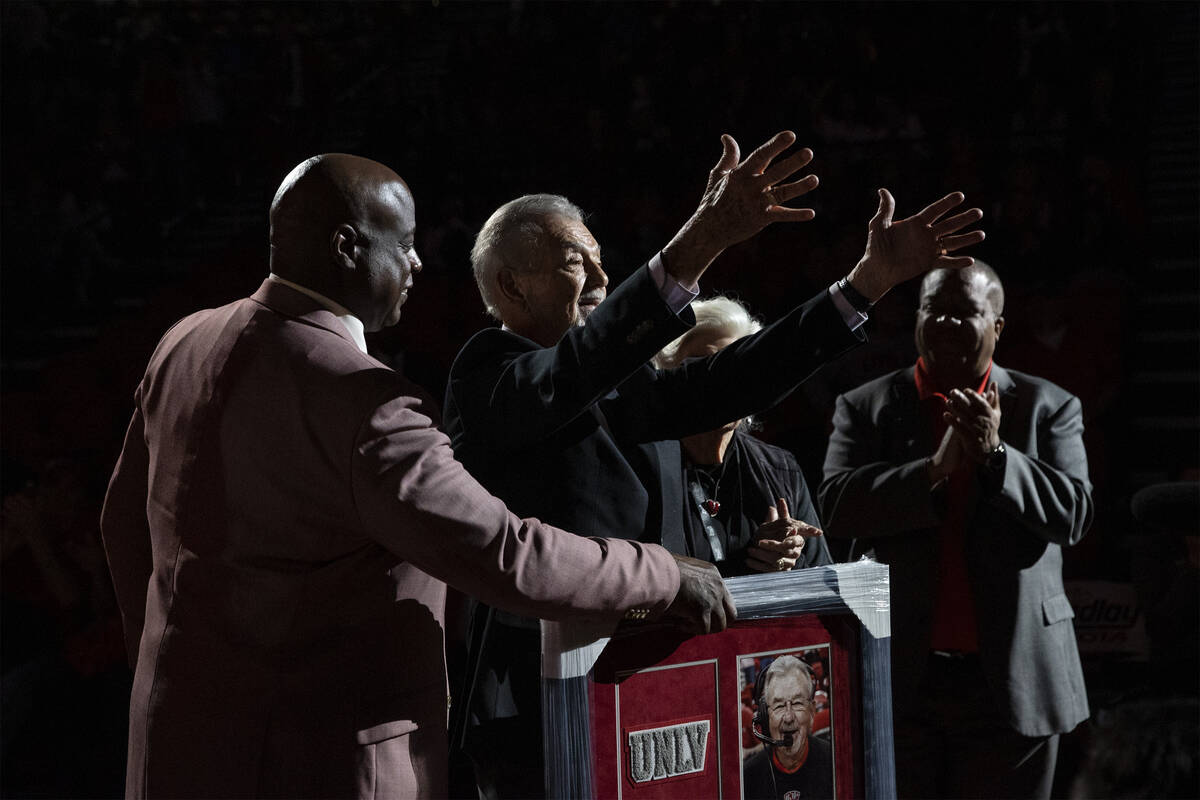 Dick Calvert, the UNLV Rebels’ longtime announcer for athletic events, center left, than ...
