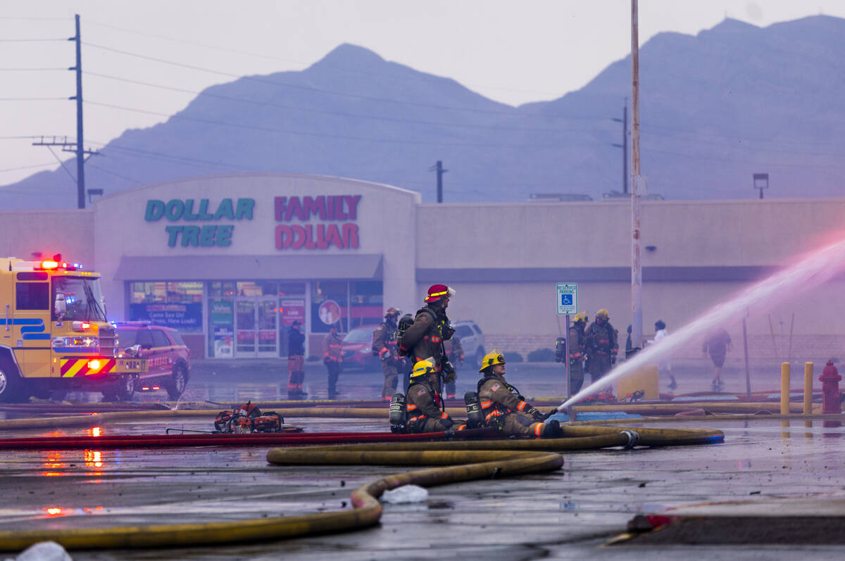 Las Vegas and Clark County Firefighters work a fully involved former Kmart store at 2975 E. Sah ...