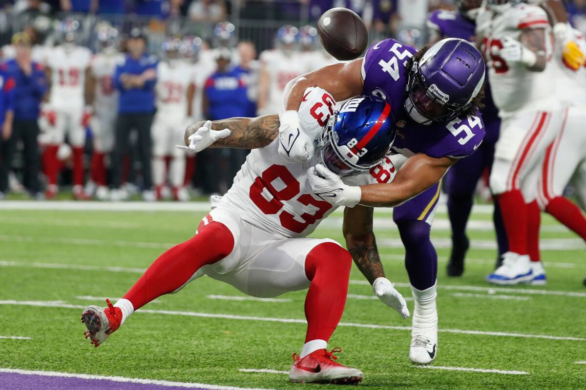 Minnesota Vikings' Eric Kendricks breaks up a pass intended for New York Giants' Lawrence Cager ...