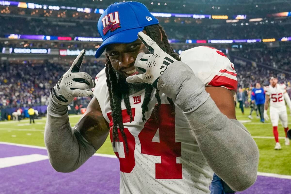New York Giants' Jaylon Smith celebrates after an NFL wild card football game against the Minne ...