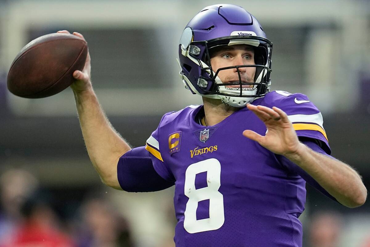 Minnesota Vikings' Kirk Cousins thorws during the first half of an NFL wild card football game ...