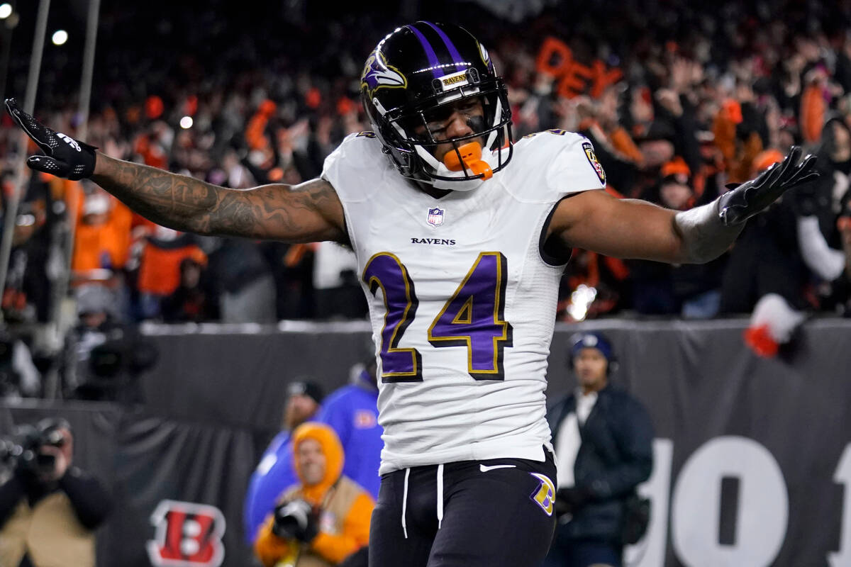 Baltimore Ravens cornerback Marcus Peters reacts to breaking up a pass intended for Cincinnati ...