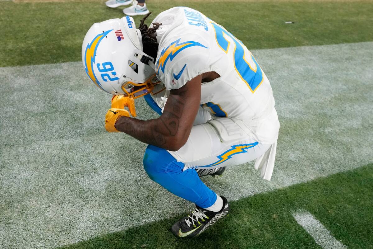 Los Angeles Chargers cornerback Asante Samuel Jr. (26) takes a moment after an NFL wild-card fo ...