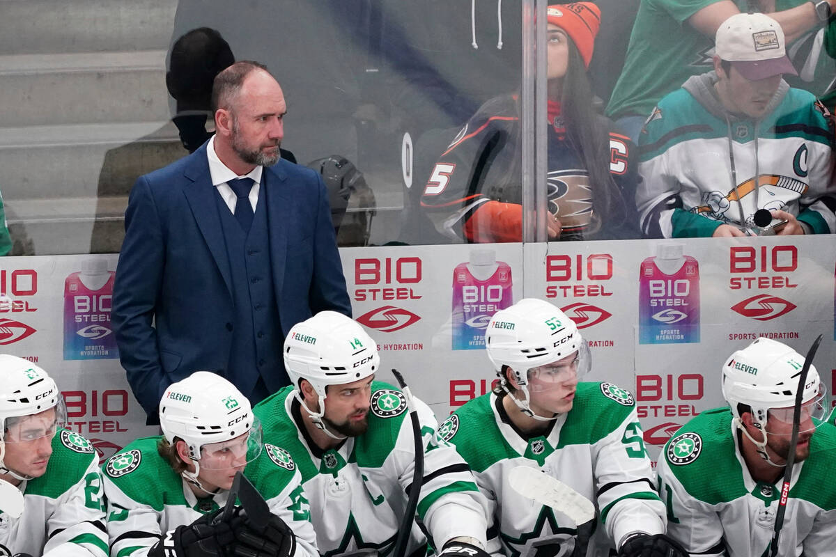 Dallas Stars head coach Peter DeBoer watches his players during the first period of an NHL hock ...