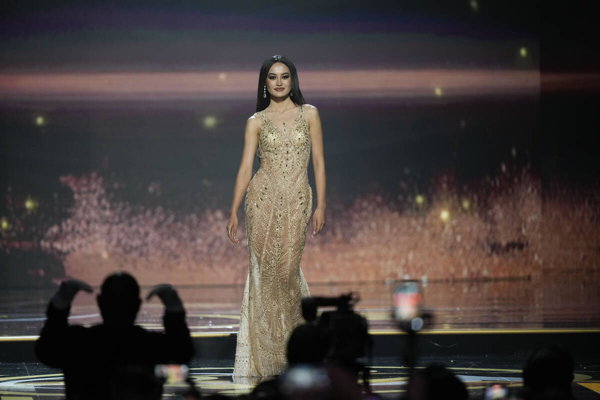 Miss Laos Payengxa Lor takes part in the evening gown competition during the final round of the ...