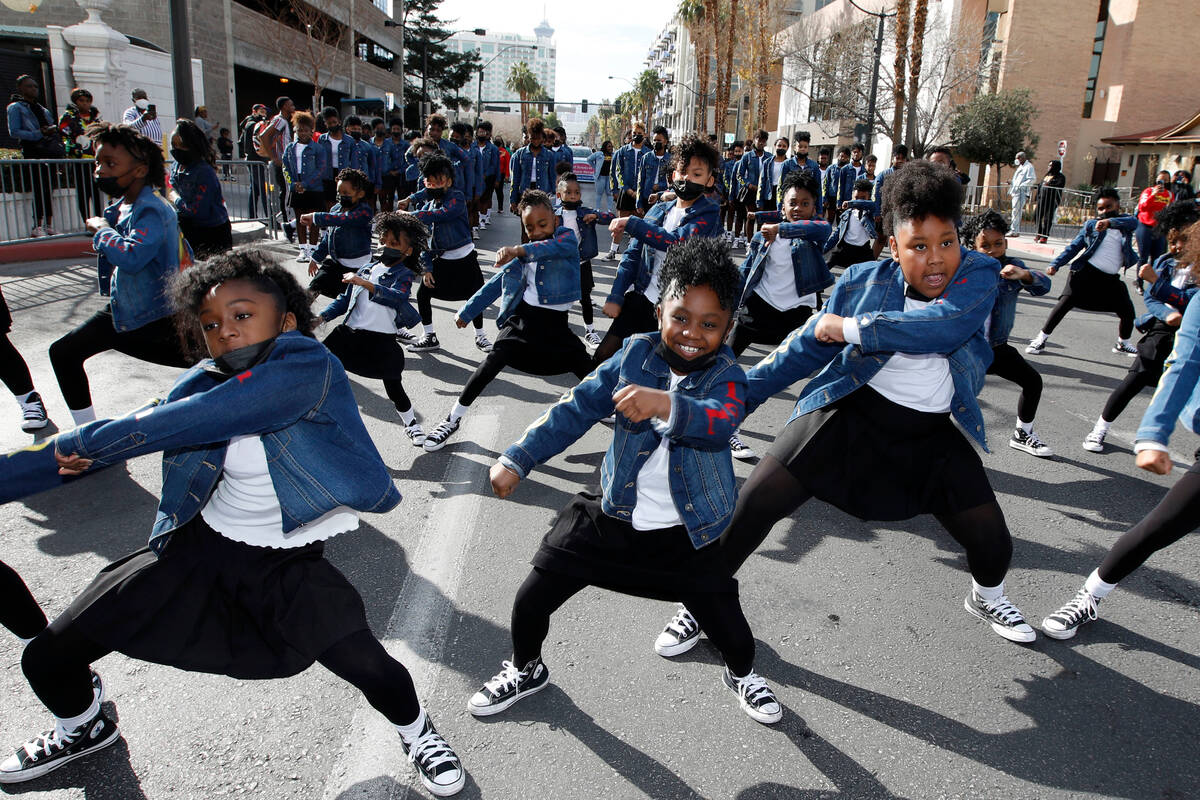 FILE - Rain is a strong possibility for the MLK Day Parade on Monday, Jan. 16, 2023, according ...