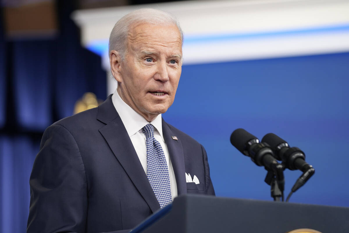 FILE - President Joe Biden responds to questions from reporters after speaking about the econom ...