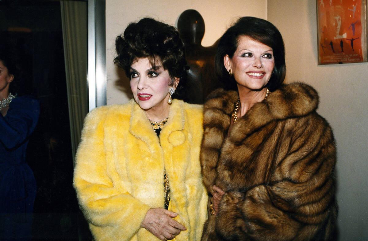 FILE - A photo taken in the 90s in Paris of Italian actress Gina Lollobrigida with Claudia Card ...