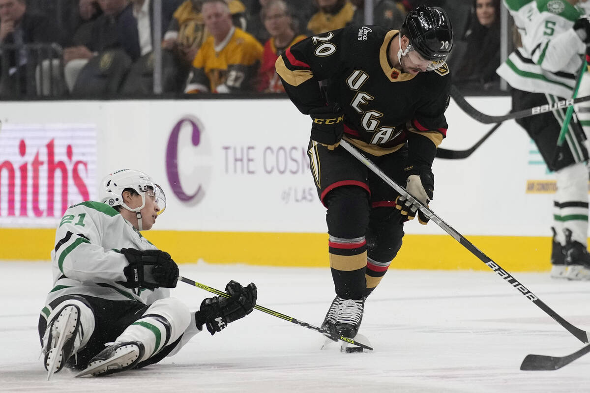 Dallas Stars left wing Jason Robertson (21) and Vegas Golden Knights center Chandler Stephenson ...