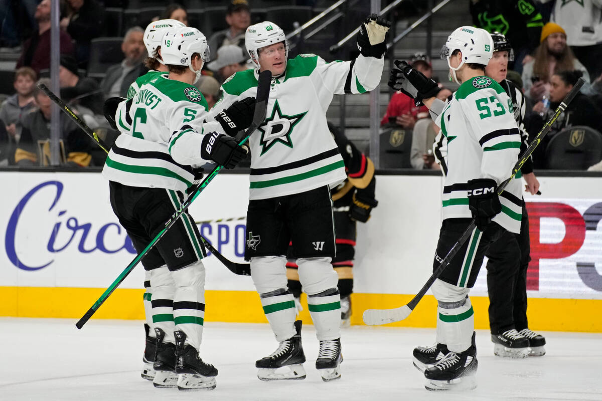 Dallas Stars defenseman Ryan Suter, second from right, celebrates after scoring against the Veg ...