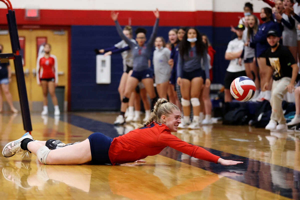 Coronado's Angelina Sayles (17) dives short to the ball for a Liberty point in a girls volleyba ...
