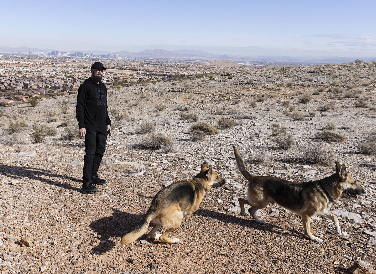 Dr. Dave Golan poses for a photo with his dogs Sophia and Jaxx, on Thursday, Jan. 19, 2023, whe ...