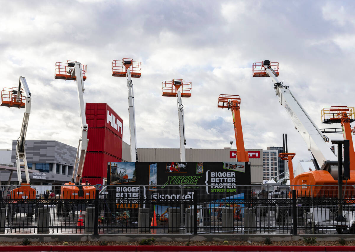 Construction lifts are displayed at the Las Vegas convention Center on Monday, Jan. 16, 2023, a ...