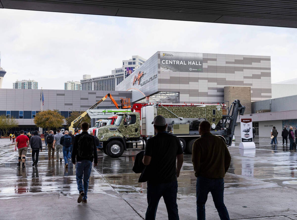 Exhibitors arrive at the Las Vegas convention Center on Monday, Jan. 16, 2023, to prepare for W ...