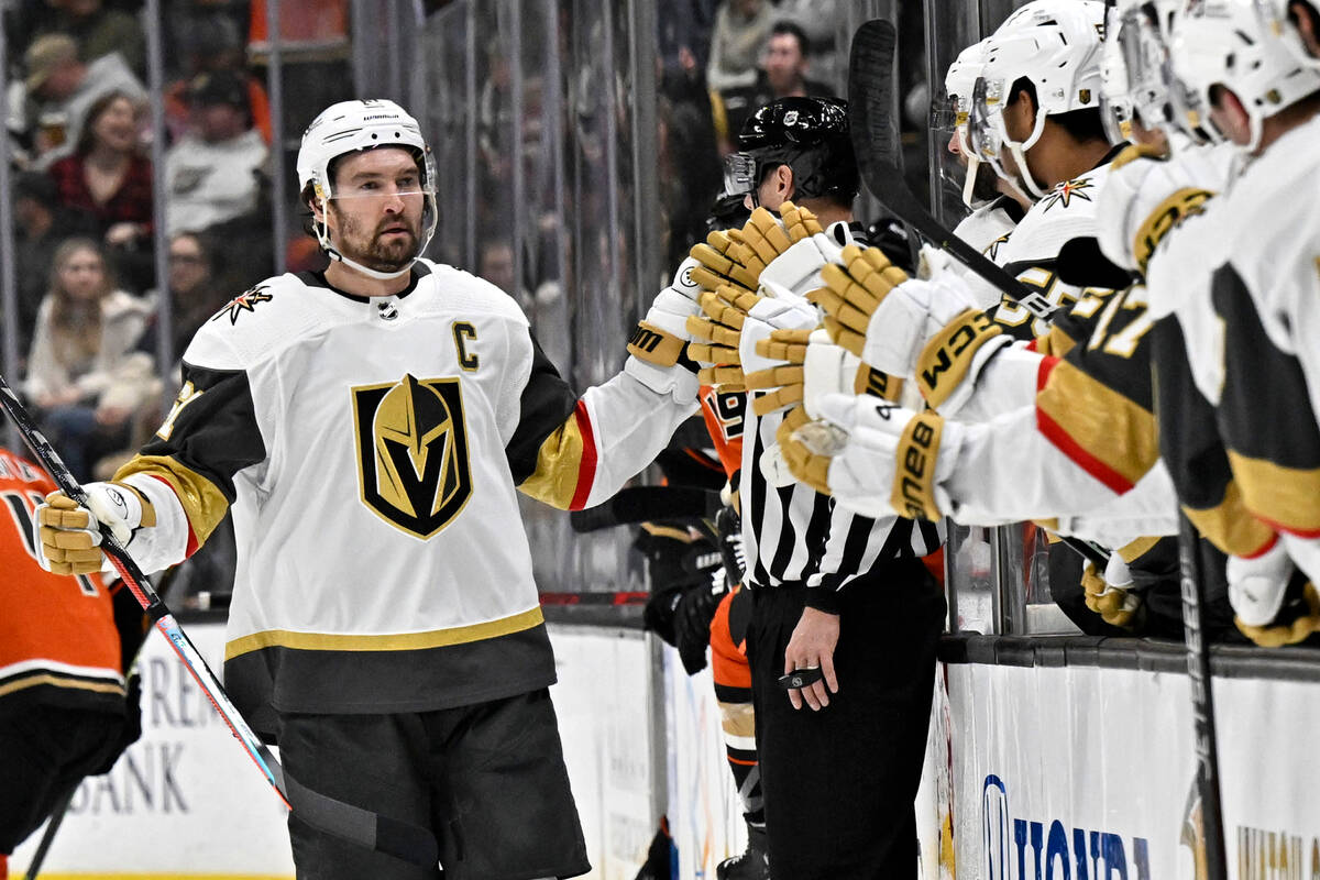 Vegas Golden Knights right wing Mark Stone, left, is congratulated after scoring a shorthanded ...