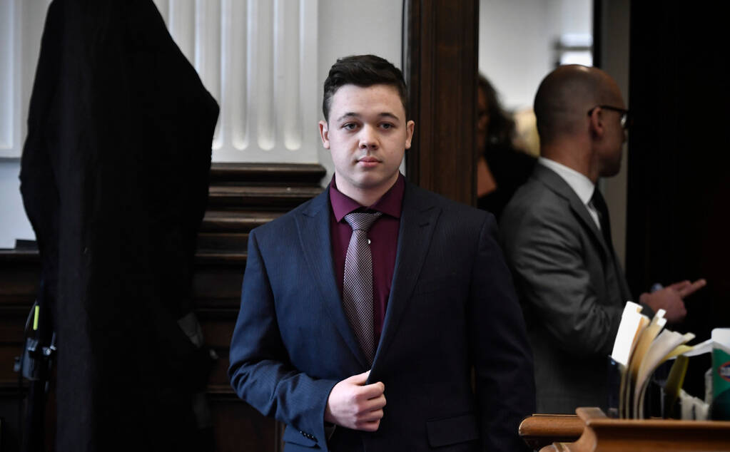 Kyle Rittenhouse enters the courtroom at the Kenosha County Courthouse in Kenosha, Wis., on Fri ...
