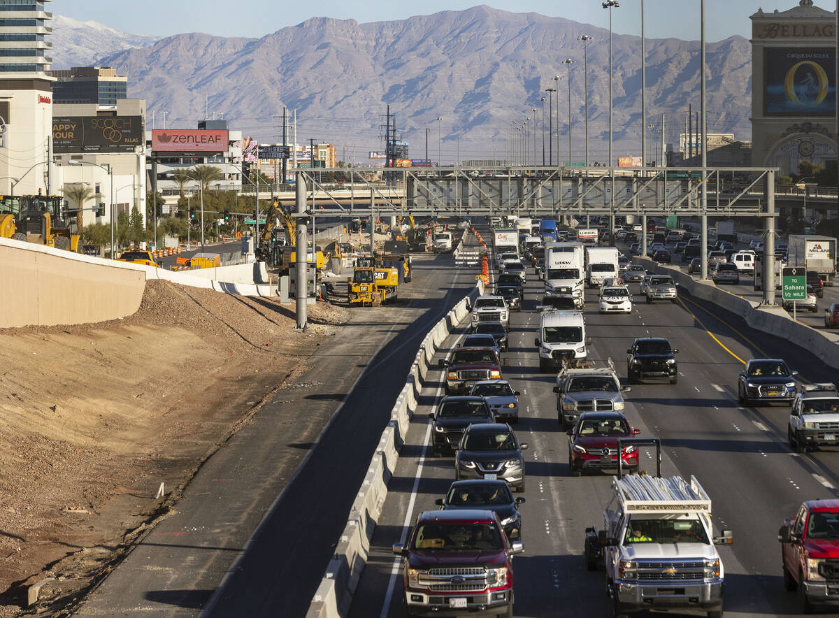 Traffic is reduced to three lanes on northbound I-15 as the Tropicana Avenue bridge exits are c ...