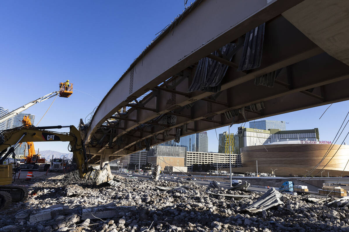 The Tropical Avenue exit is closed as workers demolish the bridge, on Wednesday, Jan. 18, 2023, ...