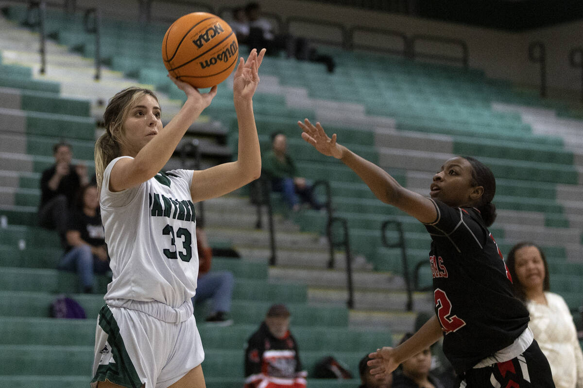 Palo Verde’s Olivia Aznarez (33) attempts a three-pointer against Las Vegas’ Jaid ...