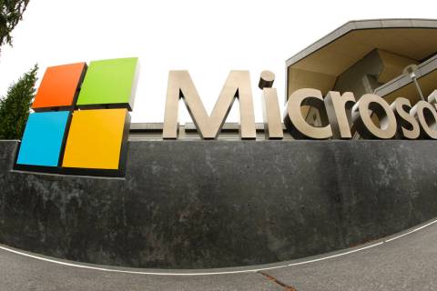 FILE - This July 3, 2014, file photo, shows the Microsoft Corp. logo outside the Microsoft Visi ...