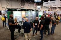 Eco Material Technologies representatives talk to conventioneers on Day 1 of World of Concrete ...