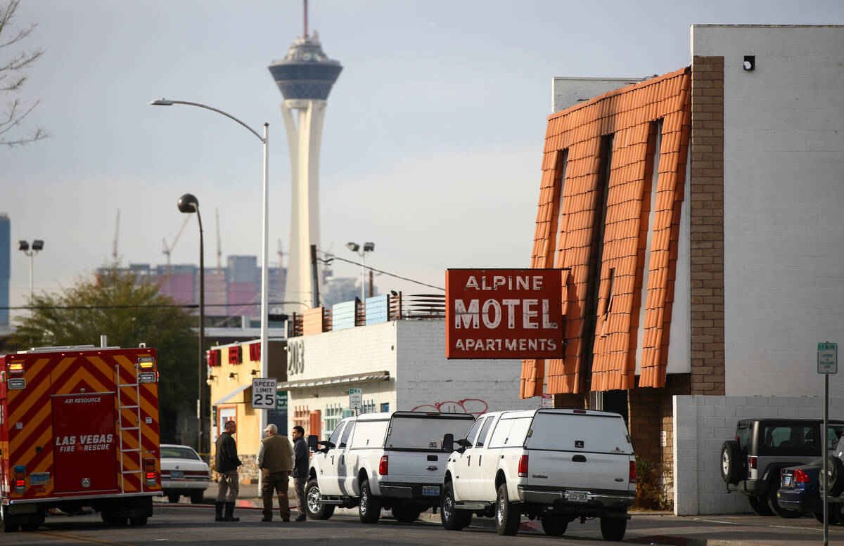 Las Vegas firefighters respond to the scene of a fire at the Alpine Apartment Motel that left 6 ...