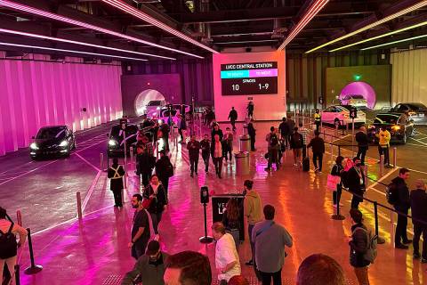 CES attendees in Central Station of the Boring Company's Vegas Loop at the Las Vegas Convention ...