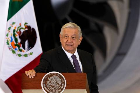 FILE - In this July 27, 2020 file photo, Mexican President Andres Manuel Lopez Obrador gives hi ...