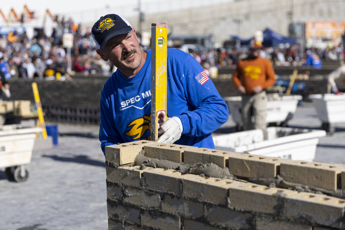 Cole Stamper participates in the World of Concrete Convention bricklaying competition at the La ...