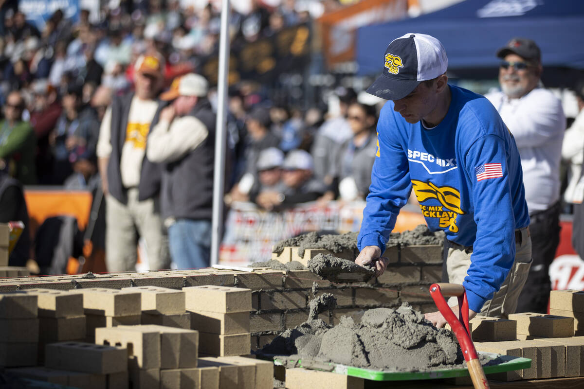 Grant Helms participates in the World of Concrete Convention bricklaying competition at the Las ...