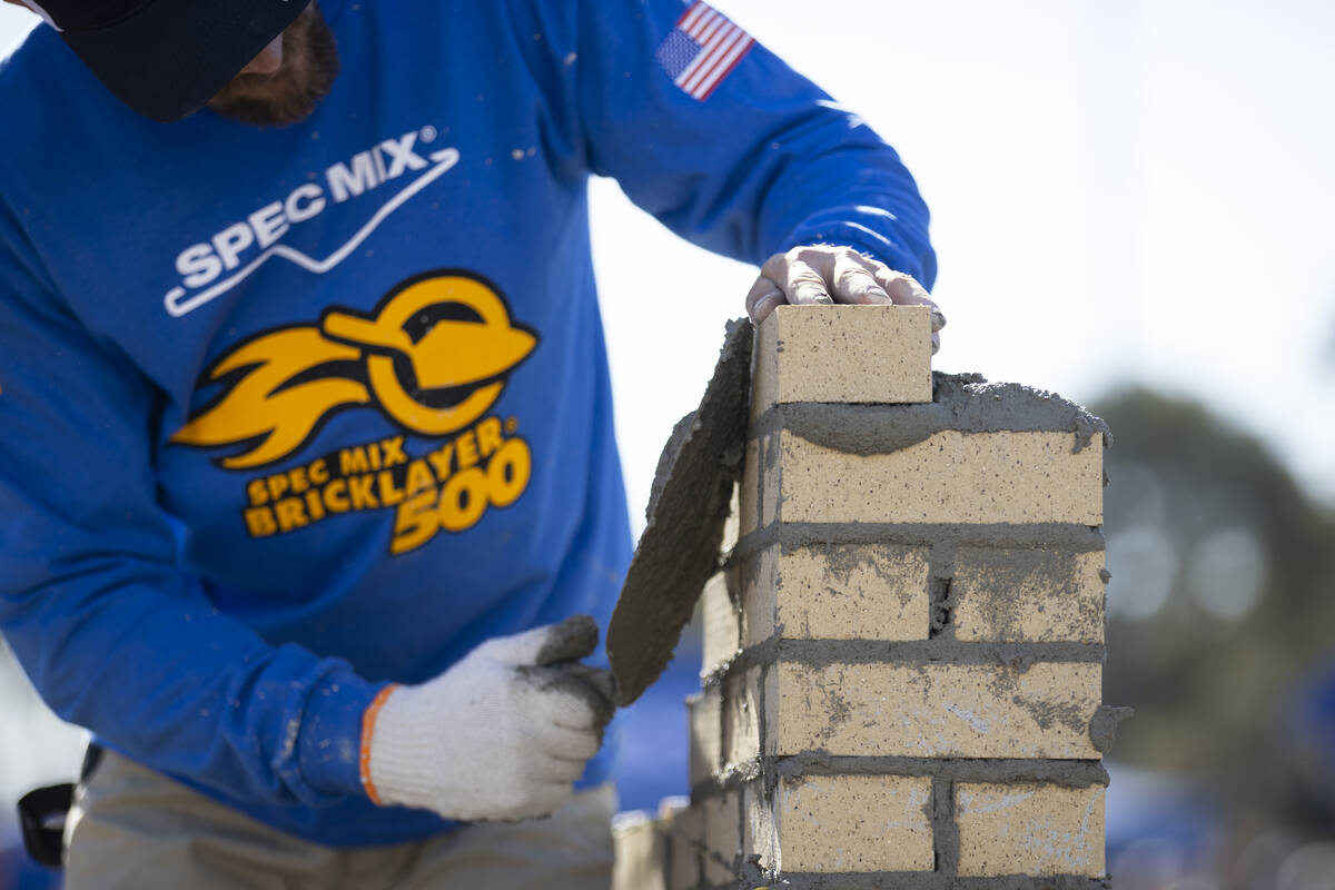 Dakota Bezemer participates in the World of Concrete Convention bricklaying competition at the ...