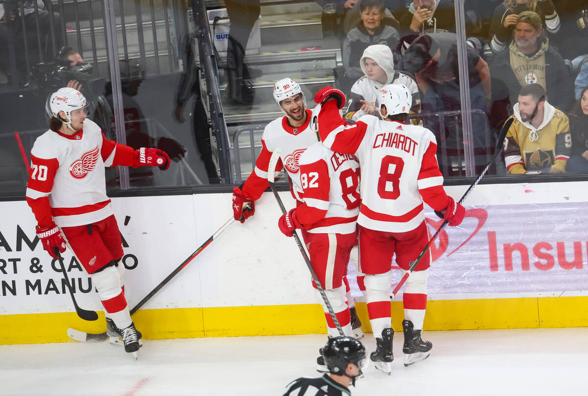 The Detroit Red Wings celebrate after a goal against the Golden Knights during the second perio ...