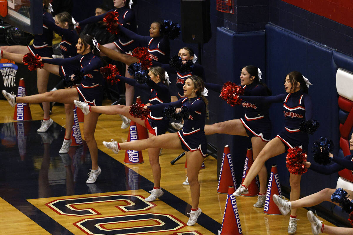 Coronado’s cheerleaders perform during the second half of a basketball game against Libe ...