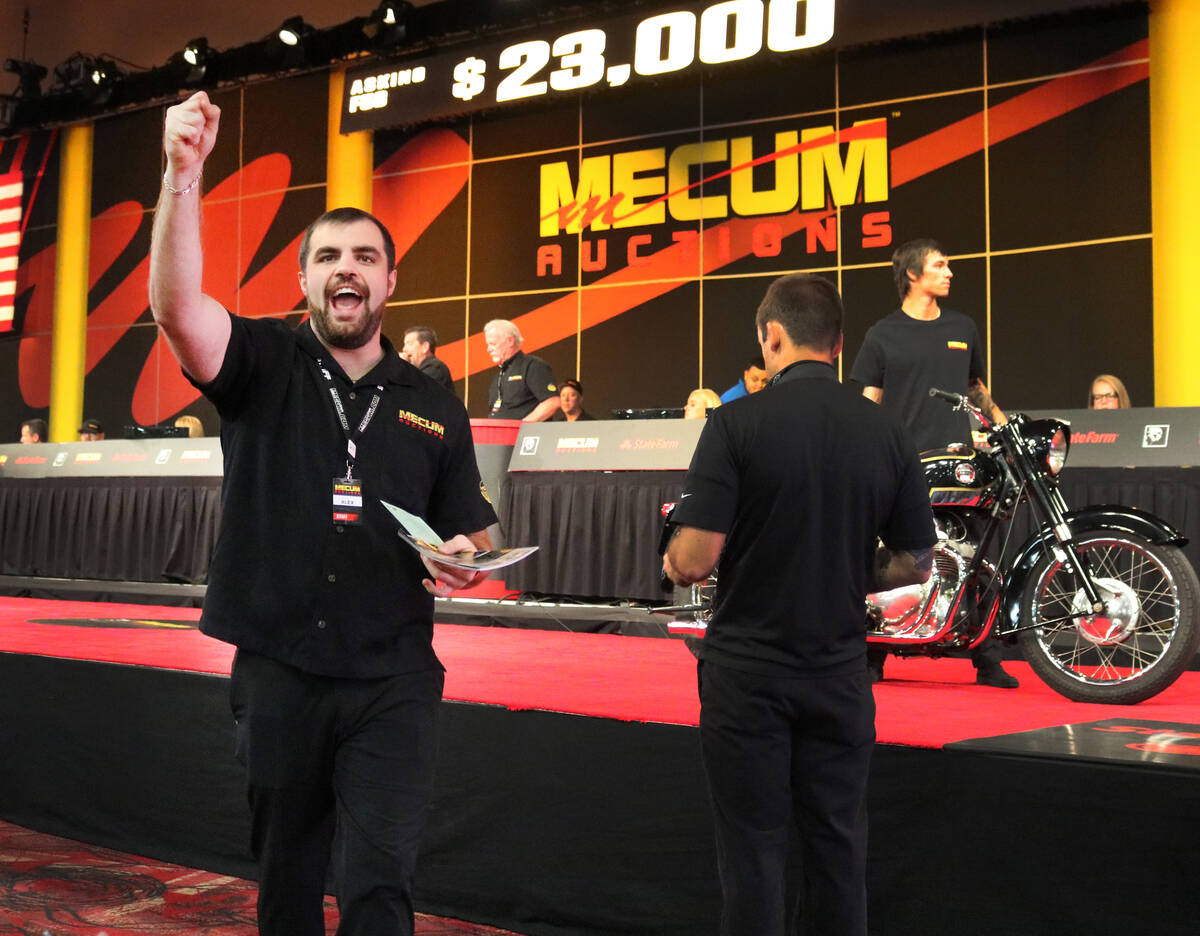 Bettor's assistant Alex McGlothlen looks for bids at Mecum Las Vegas Motorcycle Auction at Sout ...