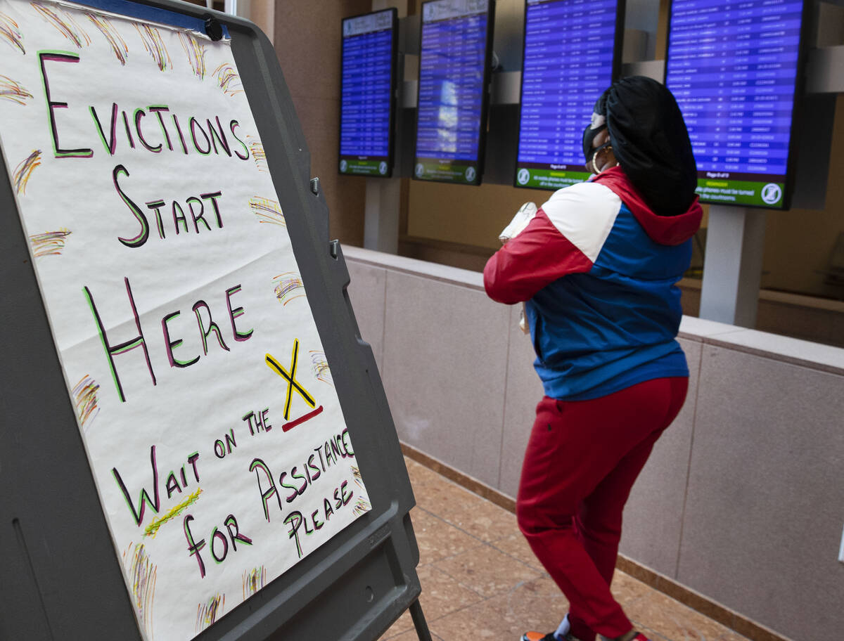 Akeba Anderson, who received an eviction notice from her landlord, arrives at the Civil Law Sel ...